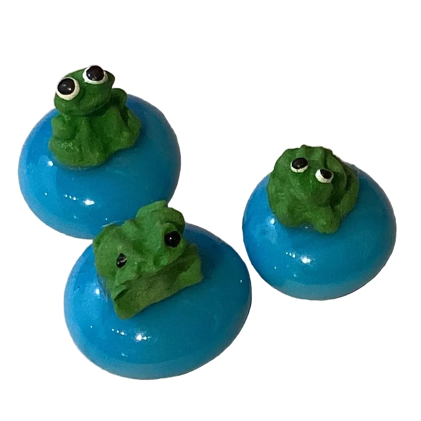 Handmade 0.75-inch frog figurine from Ysleta Mission Gift Shop, perfect for home and garden decor.