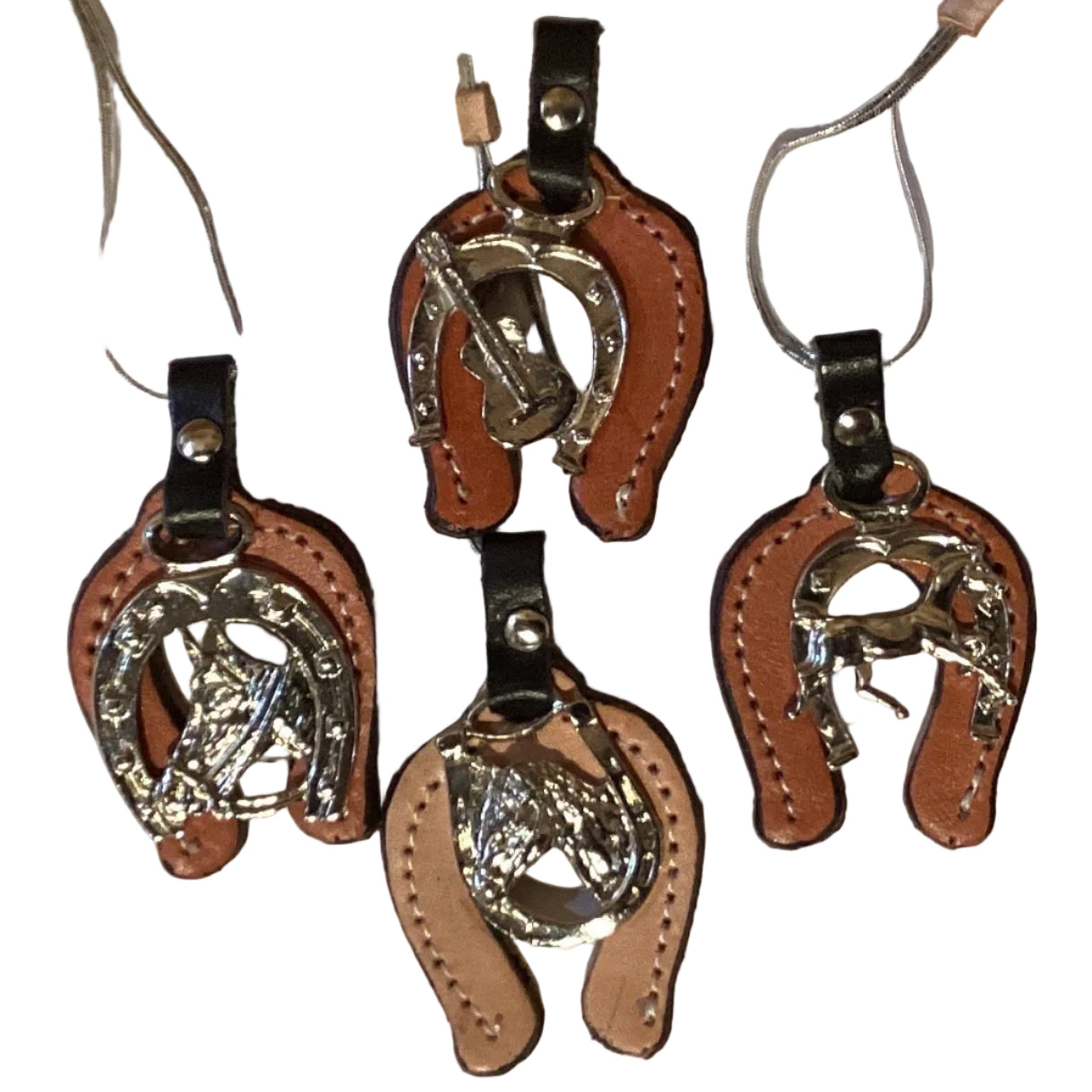 Leather horseshoe and horse western keychain from Ysleta Mission Gift Shop, El Paso souvenirs, with detailed stitching and rustic design.
