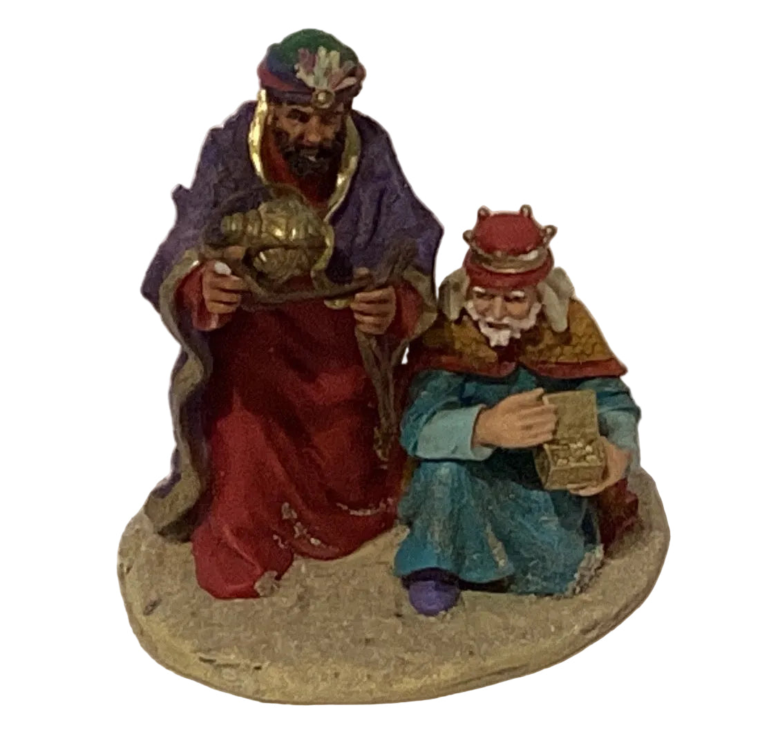 Assorted ceramic Christmas figurines from Ysleta Mission Gift Shop, 3-inch holiday holiday decor with festive designs.