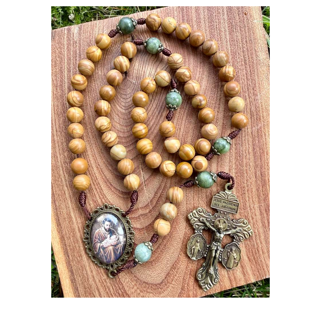 Liza Murphy Saint Joseph Catholic rosary with five decades, featuring wooden beads and a crucifix for Christian prayer and devotion.