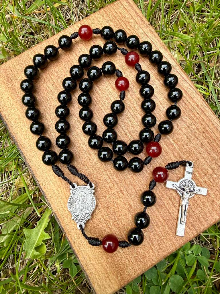 Catholic rosary with black agate and red jade beads, Sacred Heart pendant, Saint Benedict crucifix, five-decade Christian prayer bead set.