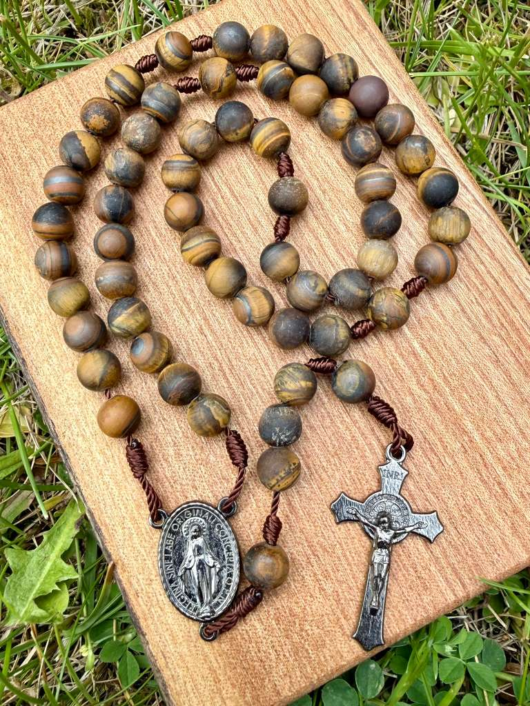 Frosted Tiger’s Eye Miraculous Medal Catholic rosary with Saint Benedict crucifix and five-decade beaded design, by Liza Murphy.