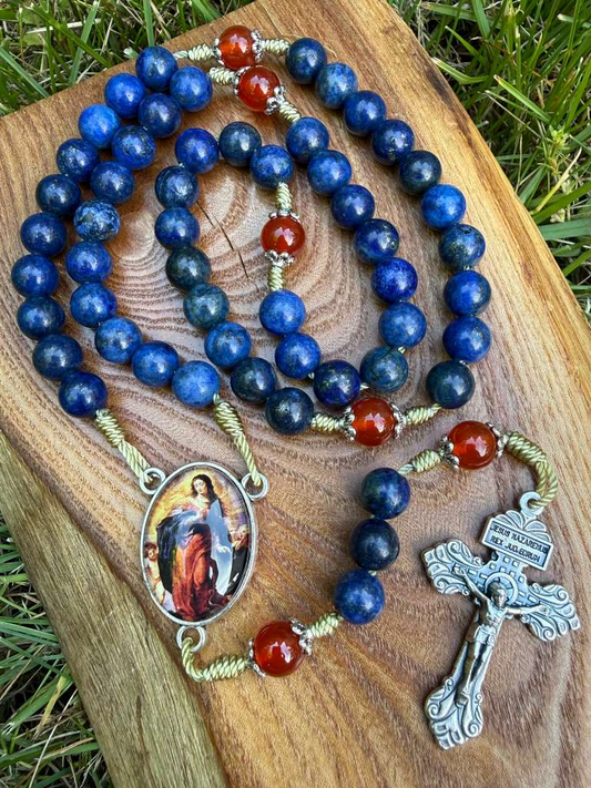 Catholic rosary with lapis lazuli and carnelian beads, featuring an Assumption of Mary centerpiece and a Pardon crucifix.