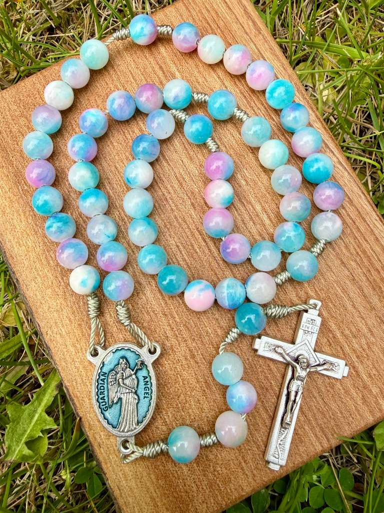 Pink and blue jade Catholic rosary with guardian angel centerpiece, five decades, ornate design, and crucifix by Liza Murphy.
