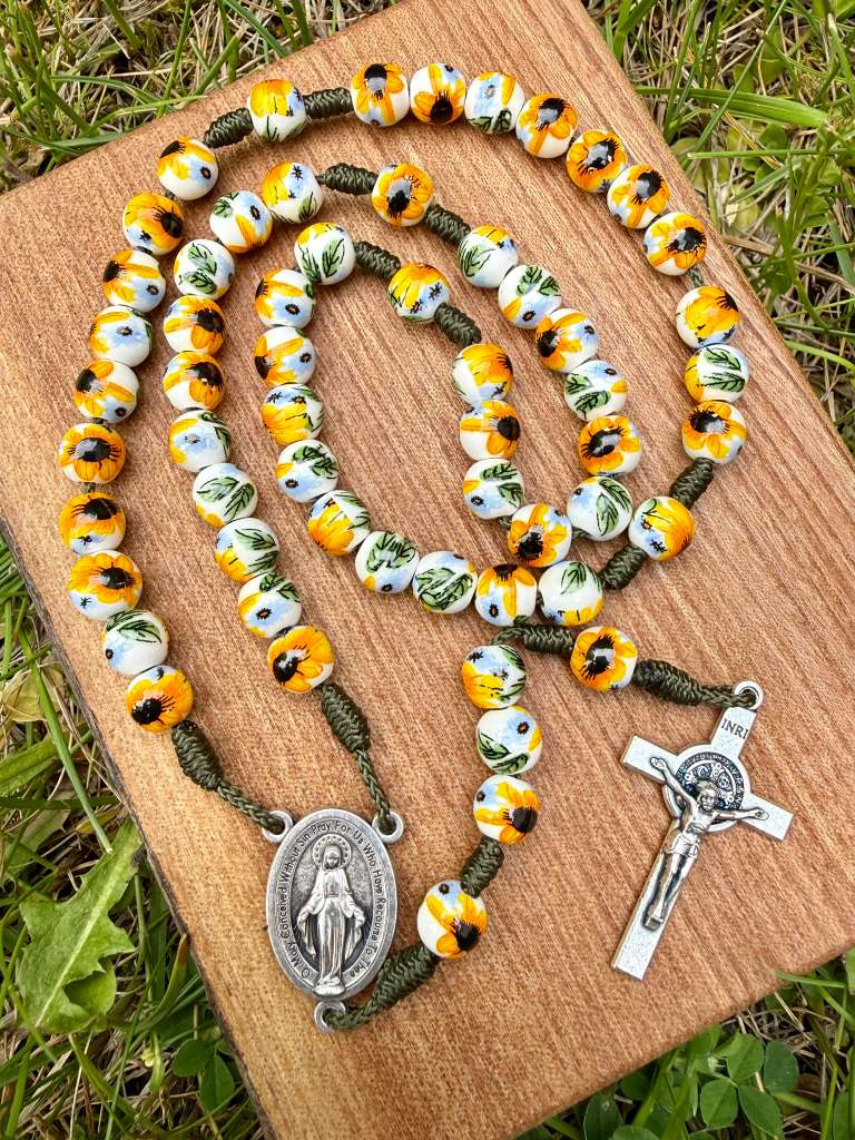Liza Murphy porcelain sunflower Miraculous Medal Catholic rosary with five decades, Saint Benedict crucifix, and detailed centerpiece.