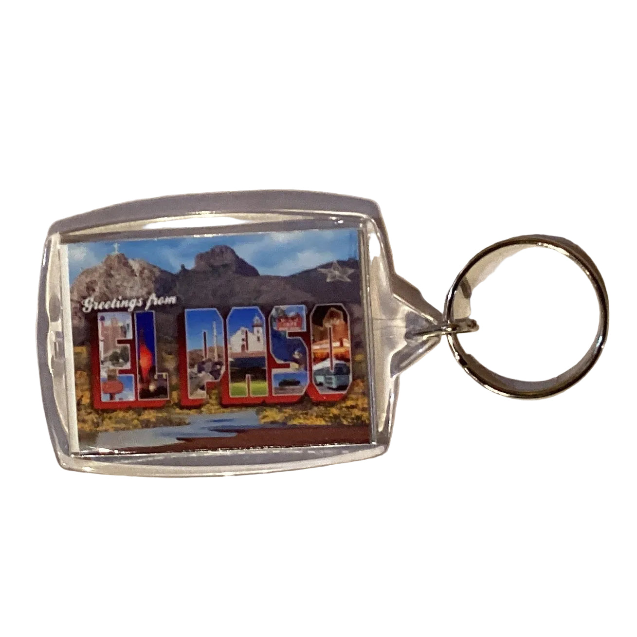 Greetings From El Paso postcard keychain with star on mountain under a blue night sky, souvenir from Ysleta Mission Gift Shop.