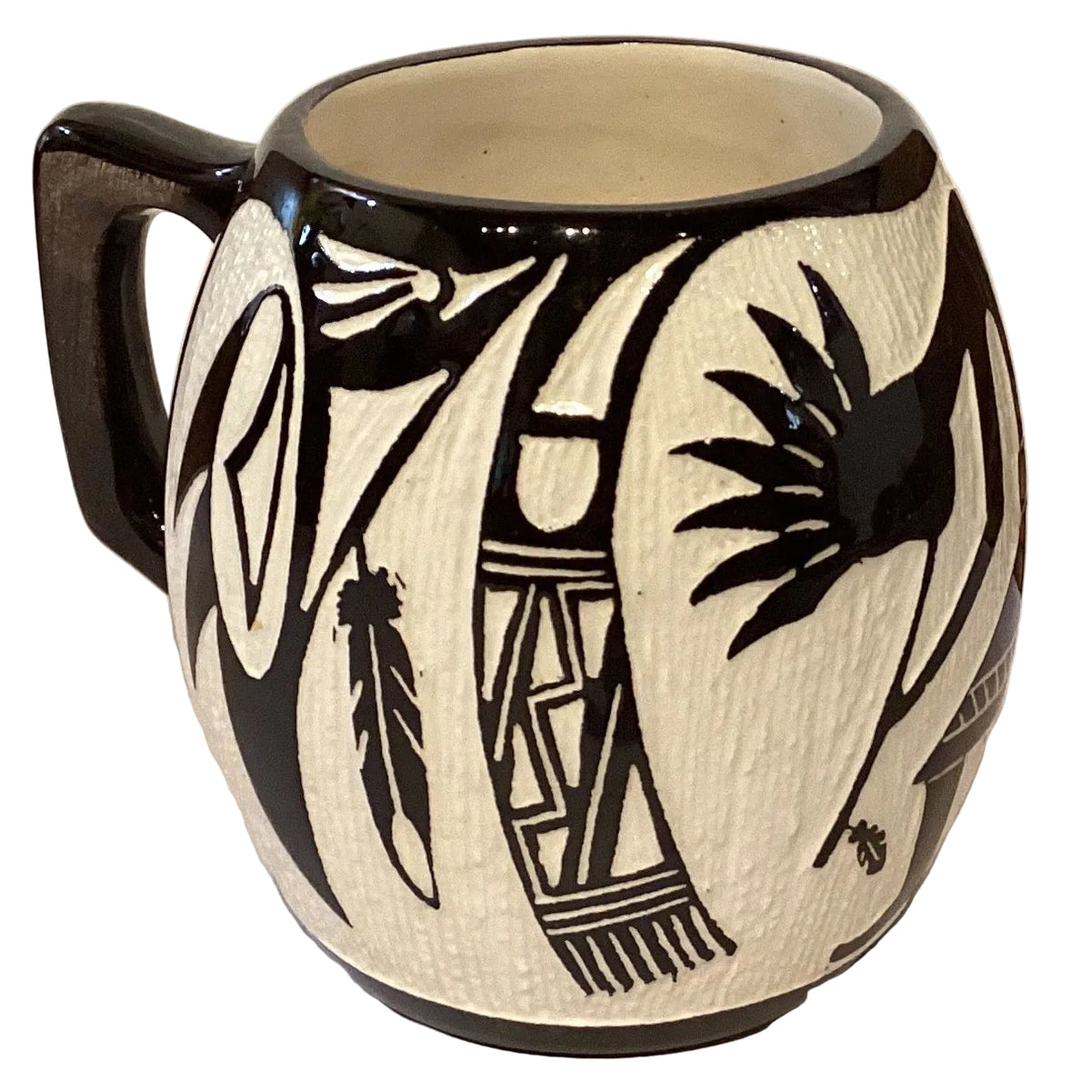 Hand-glazed Sgraffito mug with tribal-inspired design, 4-inch ceramic drinkware from Ysleta Mission Gift Shop.