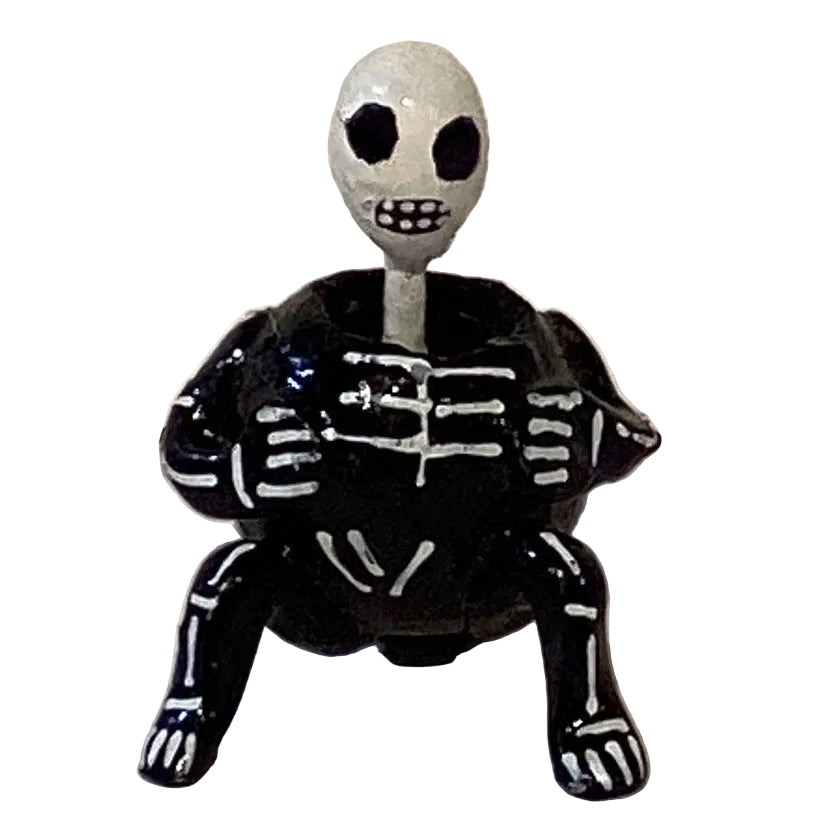 Skeleton Wobble Head figurine for home decor, featuring a detailed skeleton design with a wobbling head from Ysleta Mission Gift Shop.