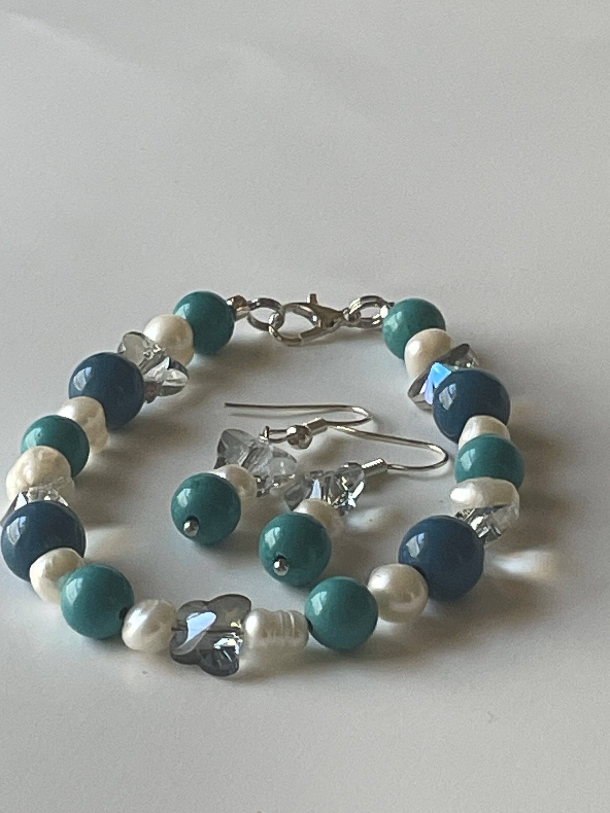 Light blue butterfly acrylic beads and turquoise stones jewelry set with matching earrings and pearl accents by Sylvia Leroux