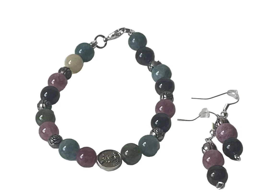 Colorful 7-inch Tourmaline bracelet with matching 2-inch silver earrings set by Sylvia Leroux, featuring multicolor gemstone accents.
