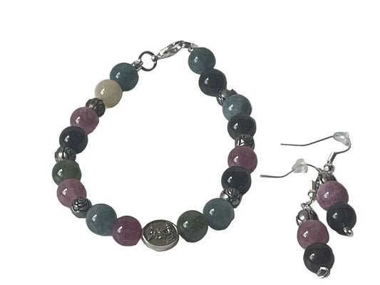 Multicolor tourmaline bracelet and silver earrings set by Sylvia Leroux featuring a 7-inch bracelet and 2-inch earrings.
