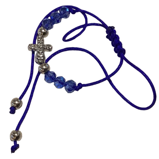 Blue beaded Catholic bracelet with cross charm, adjustable nylon jewelry for Christian gift-giving by Ysleta Mission Gift Shop