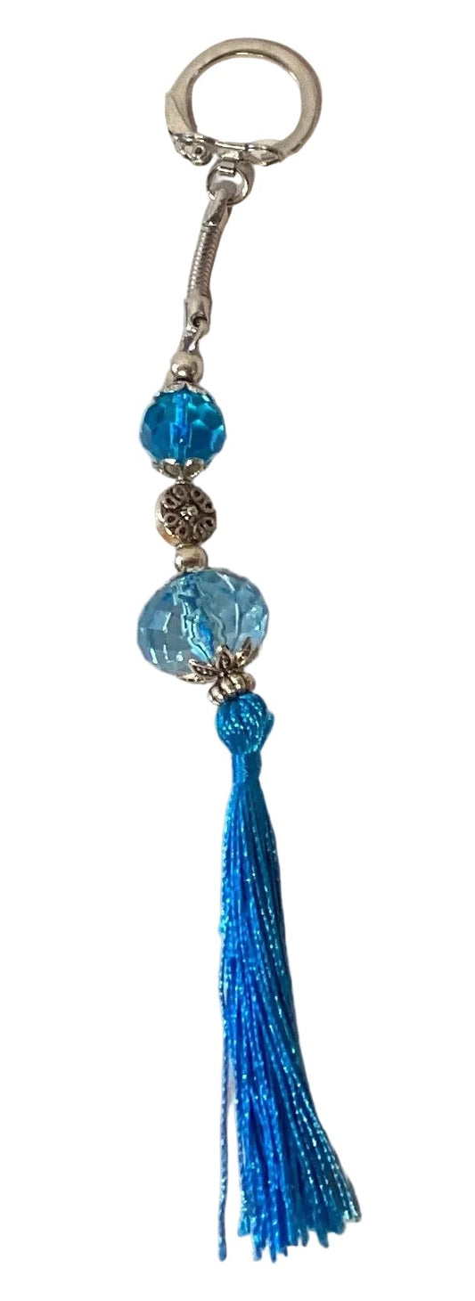 Blue beads and tassel keychain with snap hook and snake link, featuring colorful beaded design from Ysleta Mission Gift Shop.