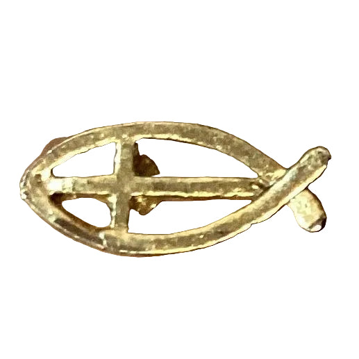 Silver fish-shaped brooch from Ysleta Mission Gift Shop, jewelry accessory with detailed design and polished finish.