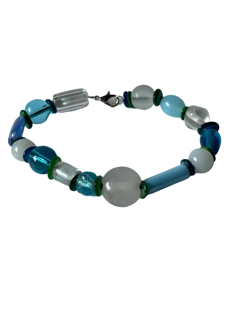 8-inch Sylvia Leroux bracelet with turquoise, white, and blue glass beads and shell spacers, stylish jewelry accessory.