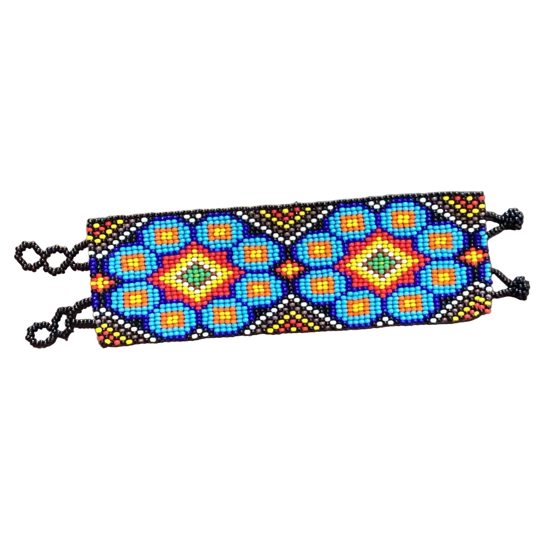 Handmade Mexican beaded wide bracelet by Jose Alberto Chavez featuring colorful intricate beadwork and traditional design.
