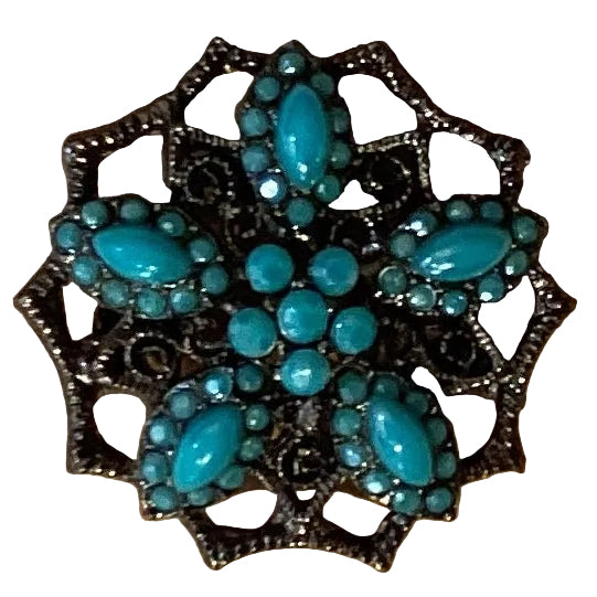 Turquoise 1.5-inch Catholic Christian brooch with religious design, jewelry from Ysleta Mission Gift Shop.
