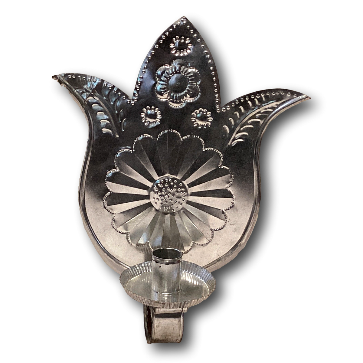 Decorative tin Repujado taper candle holder wall decor with intricate patterns, ideal for home and garden interior accents.