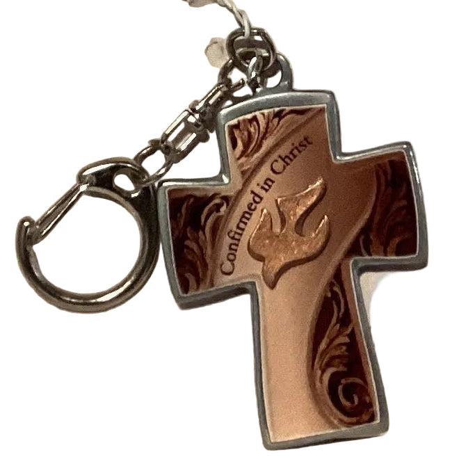 Catholic Christian keychain with "Confirmed in Christ" inscription, featuring religious symbols on a metal keychain.