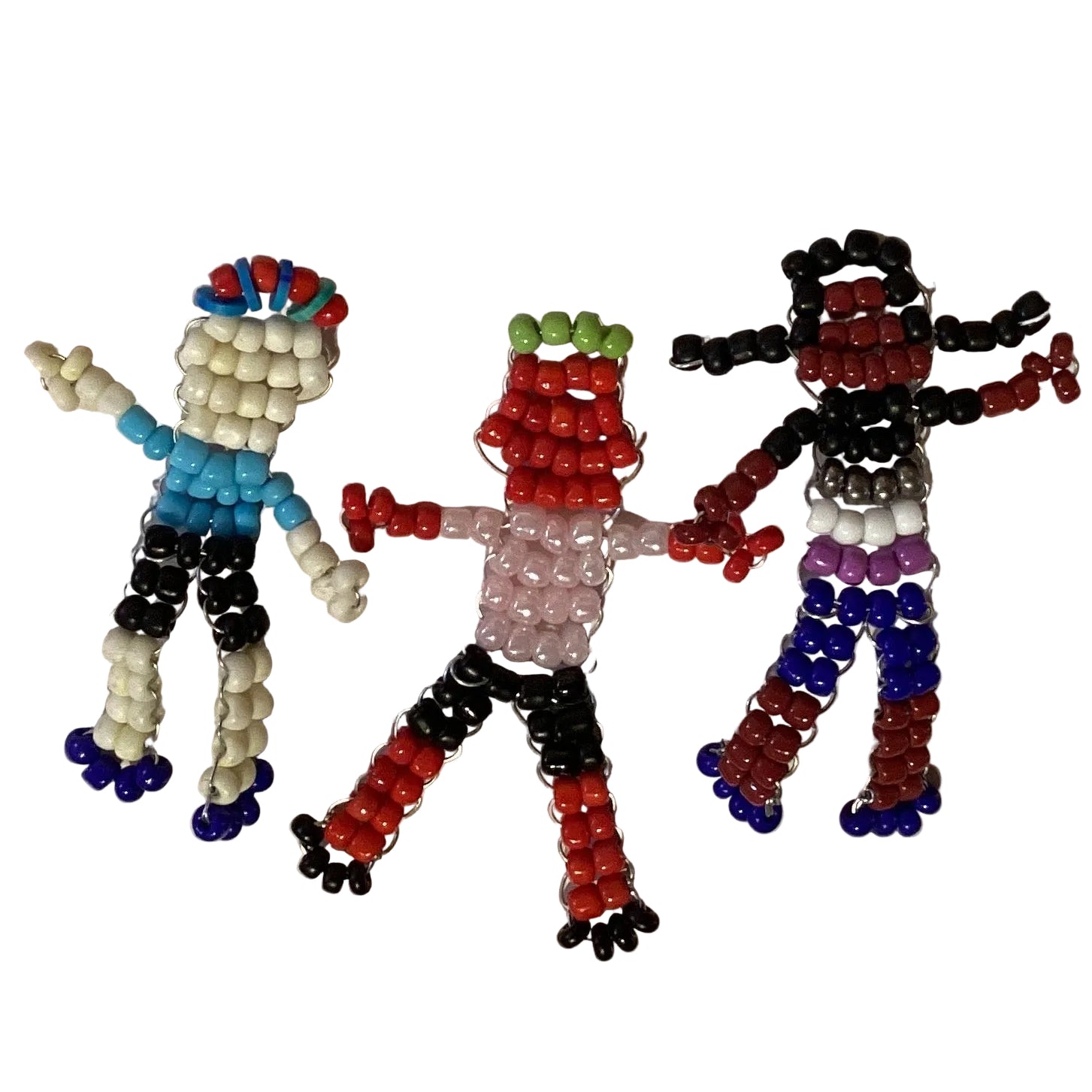 Beaded figurine measuring 1 inch from Ysleta Mission Gift Shop, featuring colorful handcrafted bead details and intricate design.