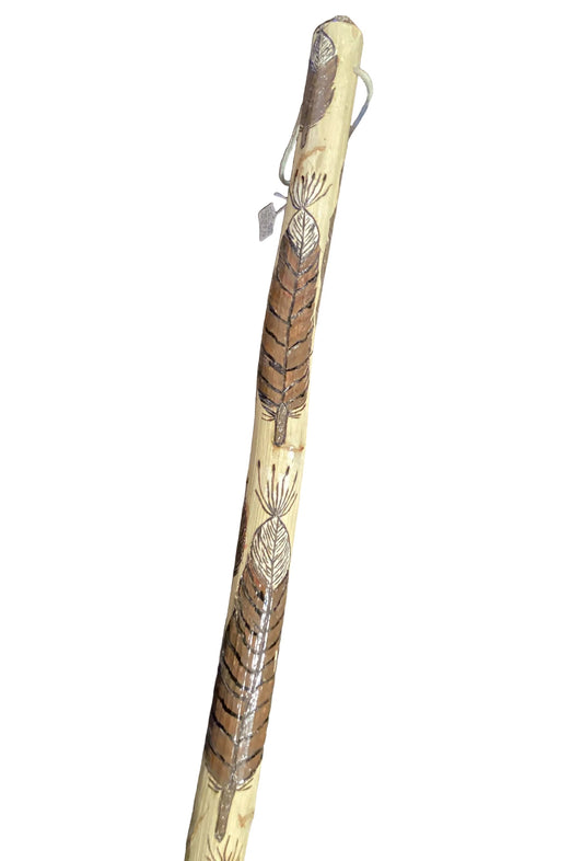 Hand-carved feather motif walking cane with a wooden handle, made in New Mexico, from Ysleta Mission Gift Shop, 5 feet 3 inches tall.