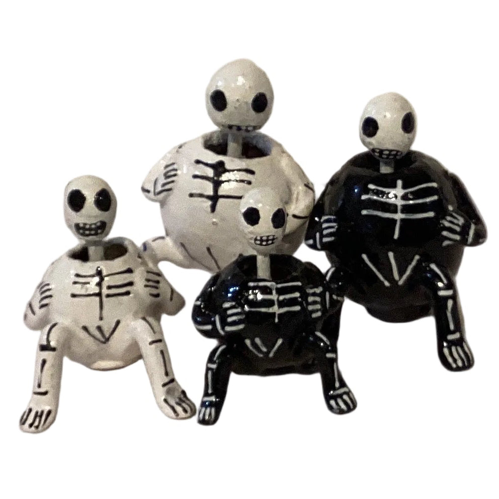 Skeleton Wobble Head figurine from Ysleta Mission Gift Shop, featuring a detailed skeleton with a wobbling head for home or garden decor.