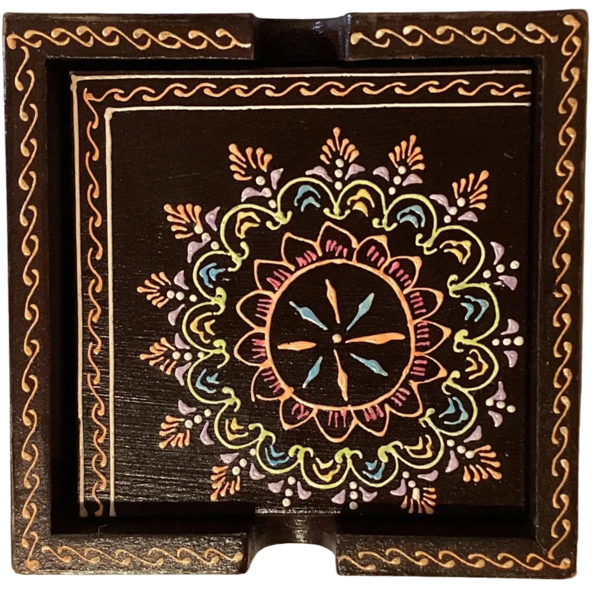 Colorful handcrafted wood mandala coaster set with folk art design, perfect for home and garden use, by Ysleta Mission Gift Shop.