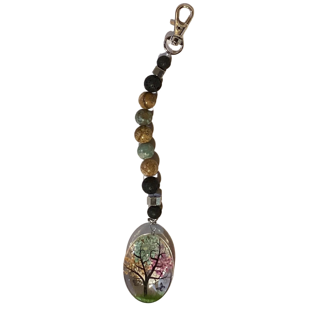 Handmade beaded keychain with glass gemstone and lava rock beads, 6-inch length, from Ysleta Mission Gift Shop.