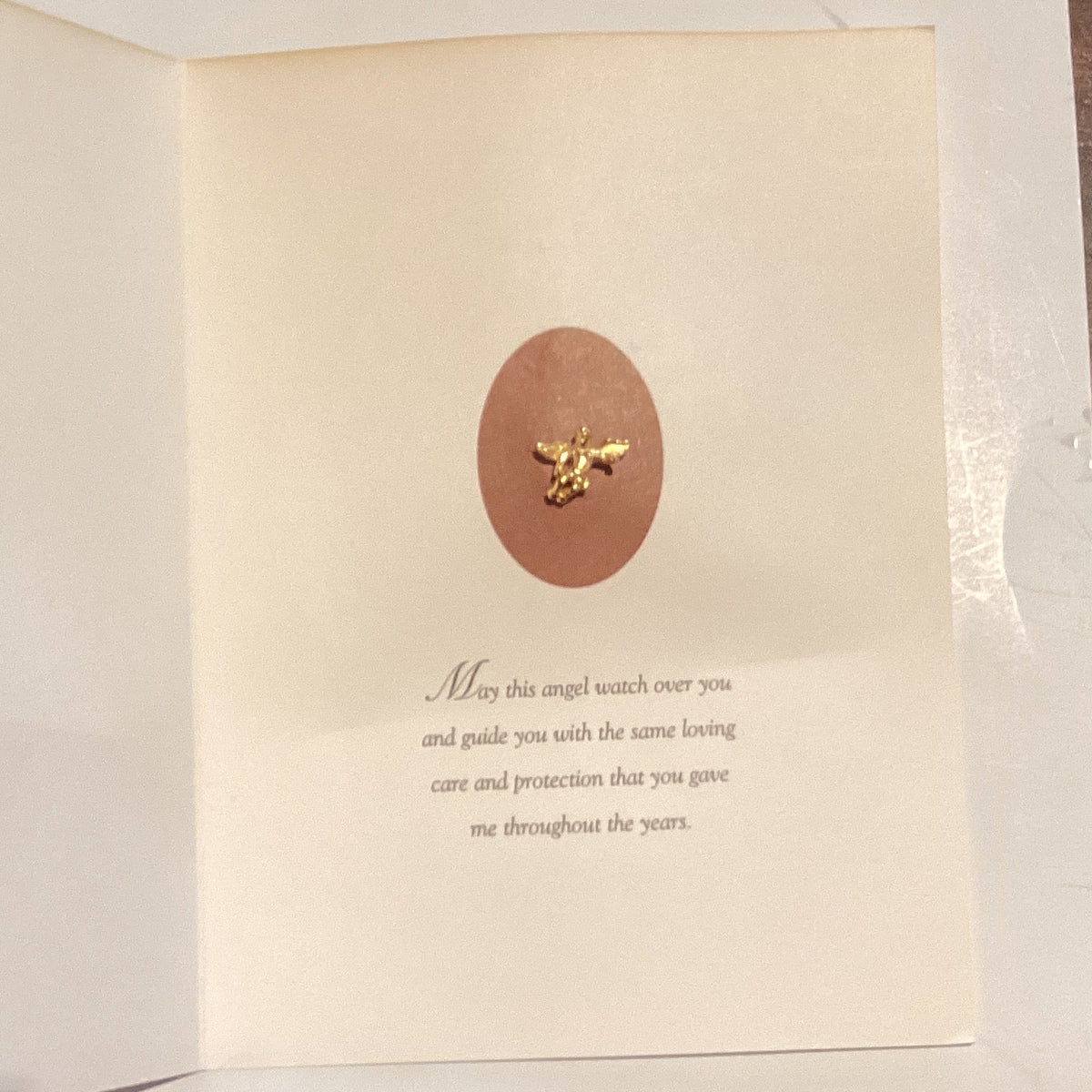 Catholic religious greeting card featuring an angel keepsake pin, symbolizing faith and protection, from Ysleta Mission Gift Shop.