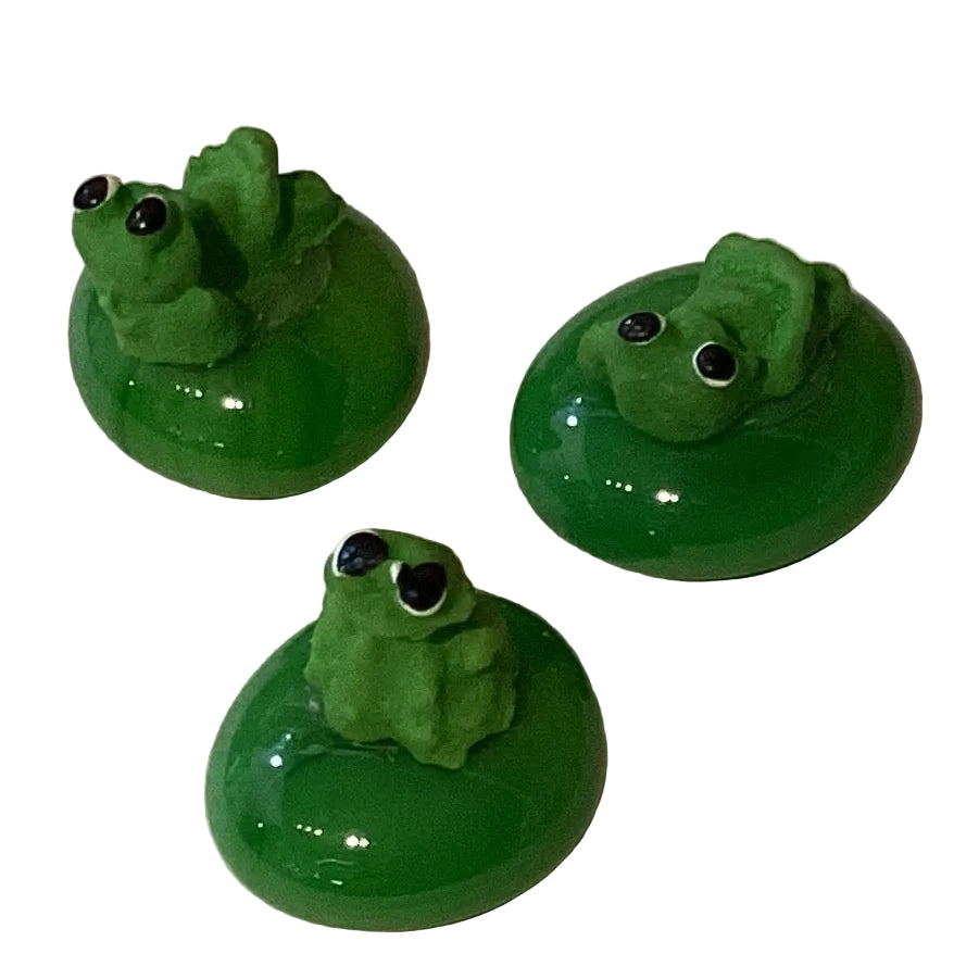 Handmade frog figurine in 0.75-inch size, crafted for home and garden decor, from Ysleta Mission Gift Shop.