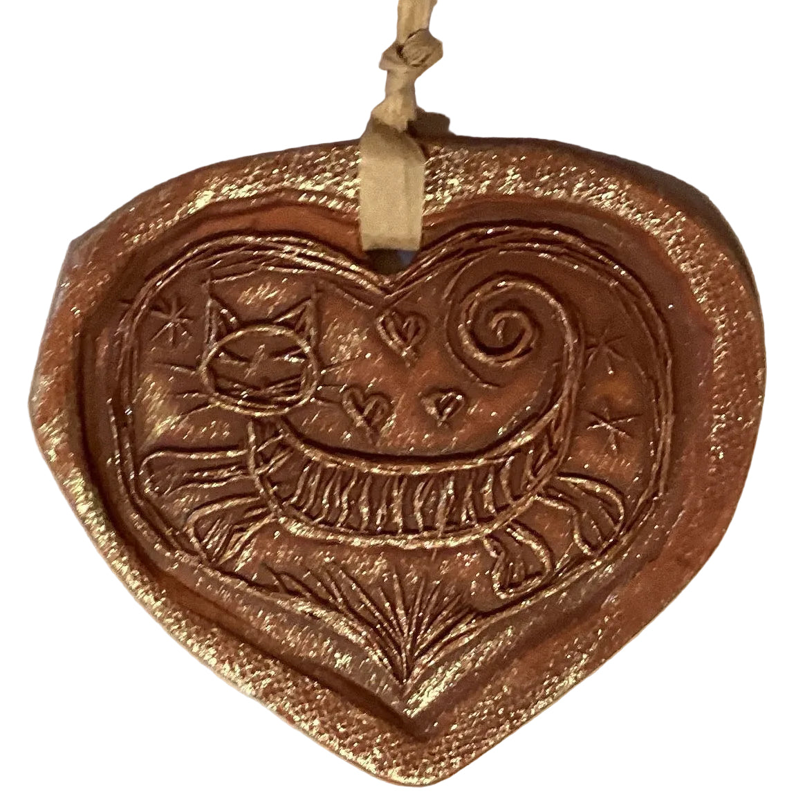 Handmade clay 4-inch decorative ornaments from Ysleta Mission Gift Shop, featuring colorful, handcrafted designs for home decor.