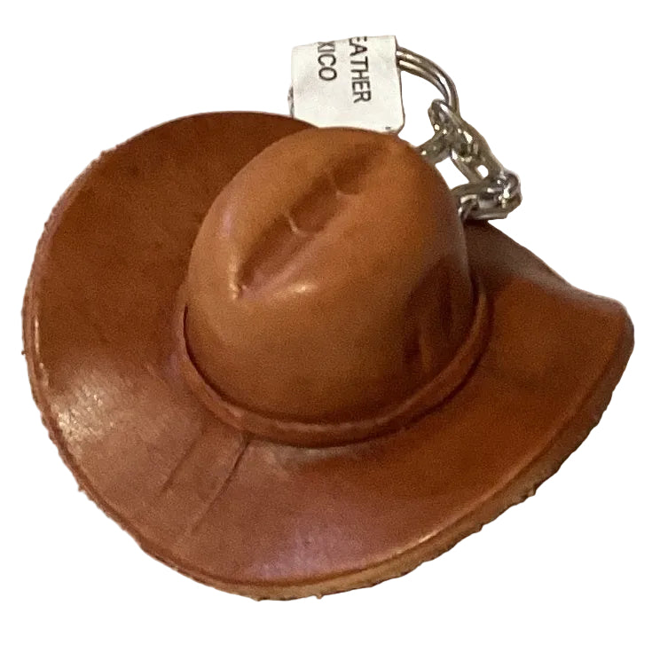 Mini leather cowboy hat keychain featuring Western Texas style, with Ysleta Mission branding and detailed stitching.