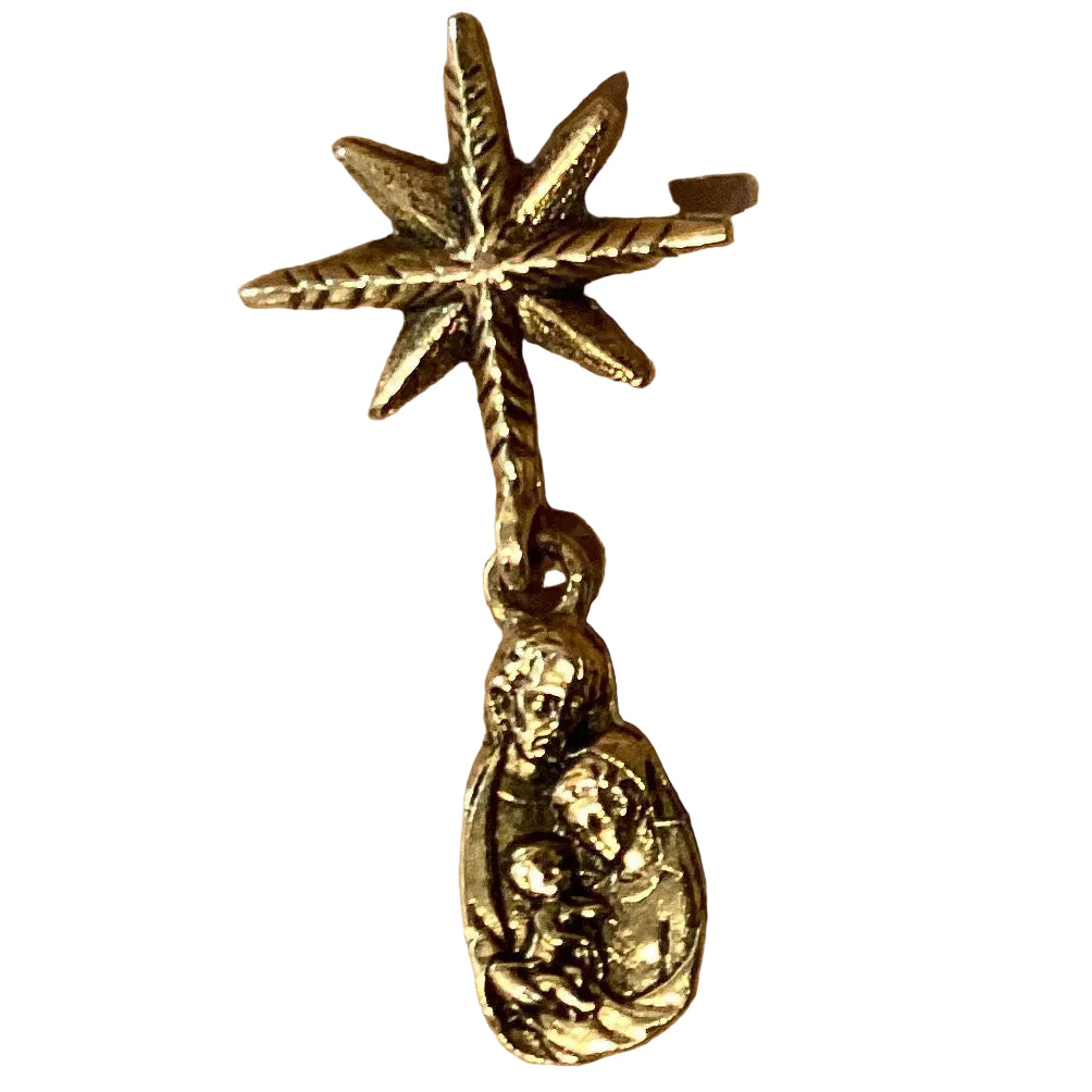 Goldtone Holy Family brooch from Ysleta Mission Gift Shop, featuring detailed religious jewelry and decorative lapel pin.