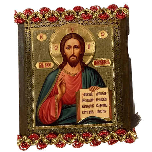 Jesus plaque from Ysleta Mission Gift Shop featuring a detailed religious figure on a decorative wooden or ceramic plaque.