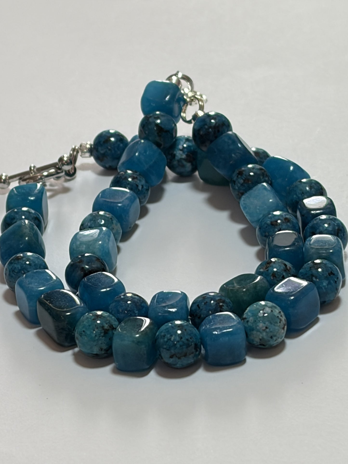 Sylvia Leroux classic pendant necklace with 20-inch chain, turquoise and jasper stones, silver lobster clasp, and toggle clasp detail.