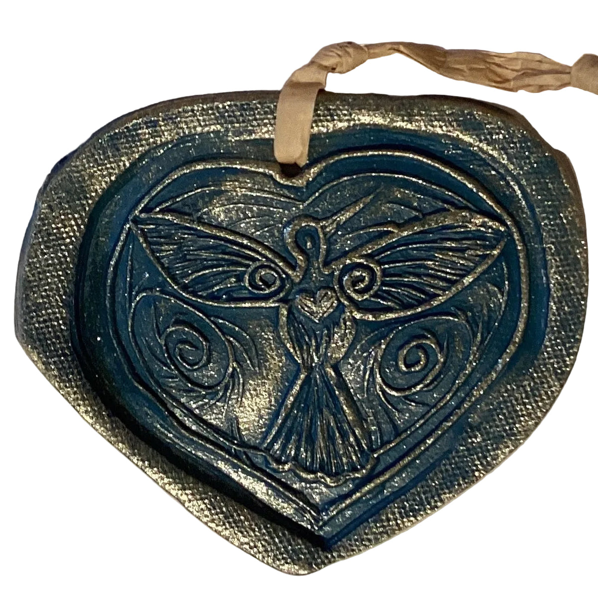Handmade clay 4-inch decorative ornaments from Ysleta Mission Gift Shop, featuring colorful, handcrafted designs for home decor.