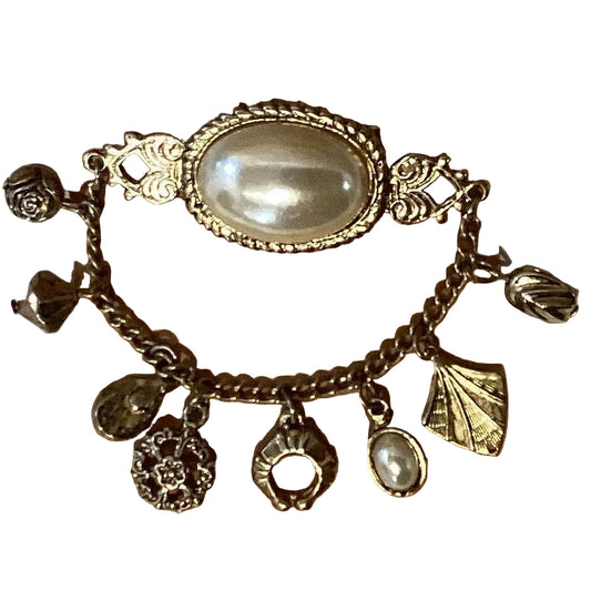 Silver pearl dangling charms brooch featuring Catholic Christian symbols, ideal for religious jewelry and gift accessories.