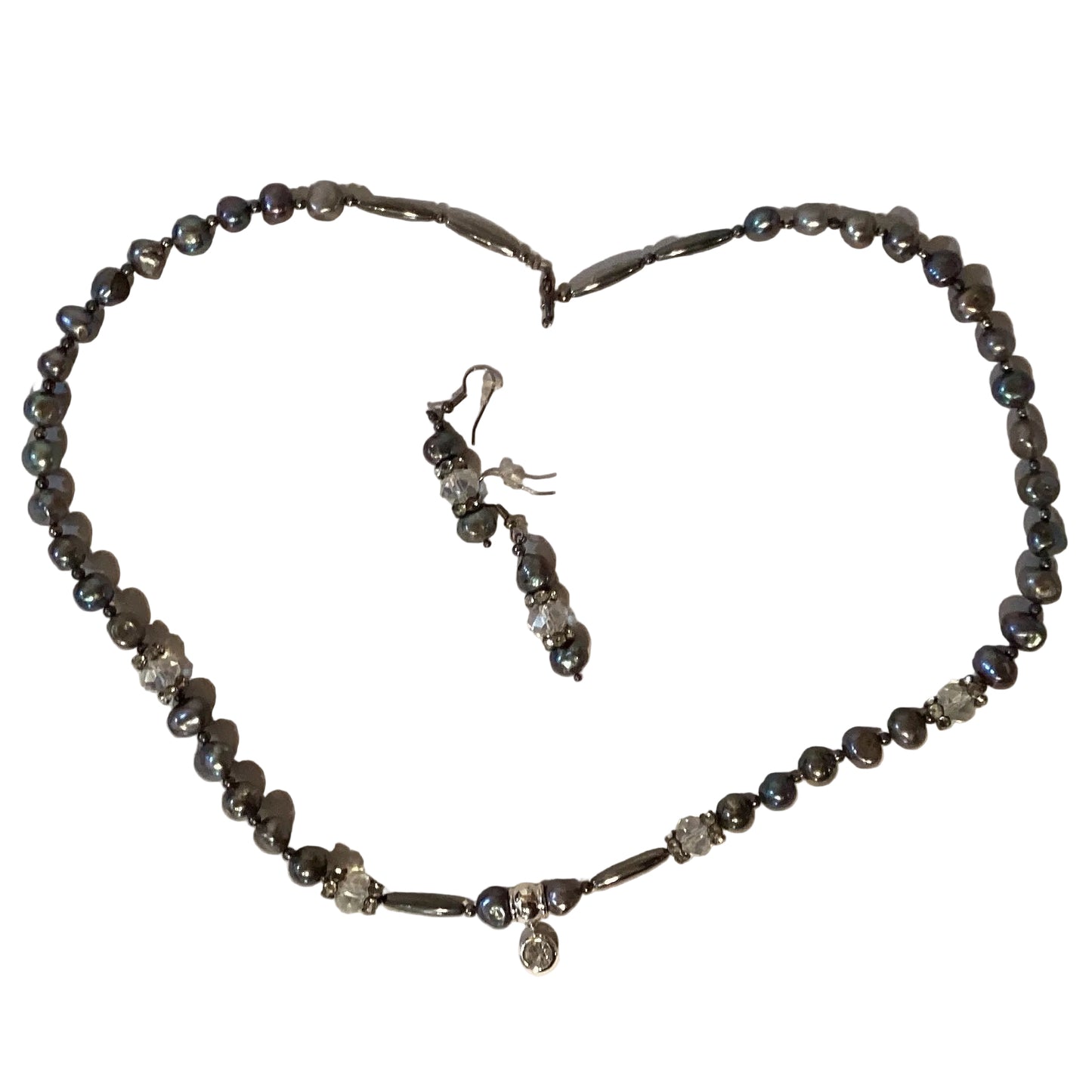 Silver beaded jewelry set with matching earrings and a 26-inch beaded necklace, featuring intricate beadwork and silver accents.