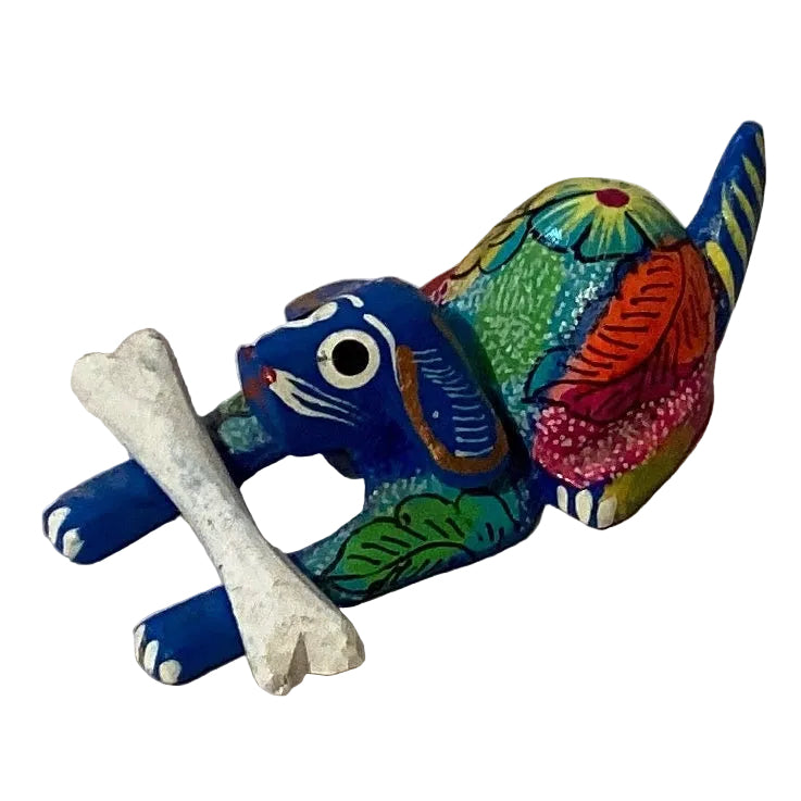 Wooden dog figurine holding a bone, 2-inch size, from Ysleta Mission Gift Shop, suitable as a decorative home and garden figurine.