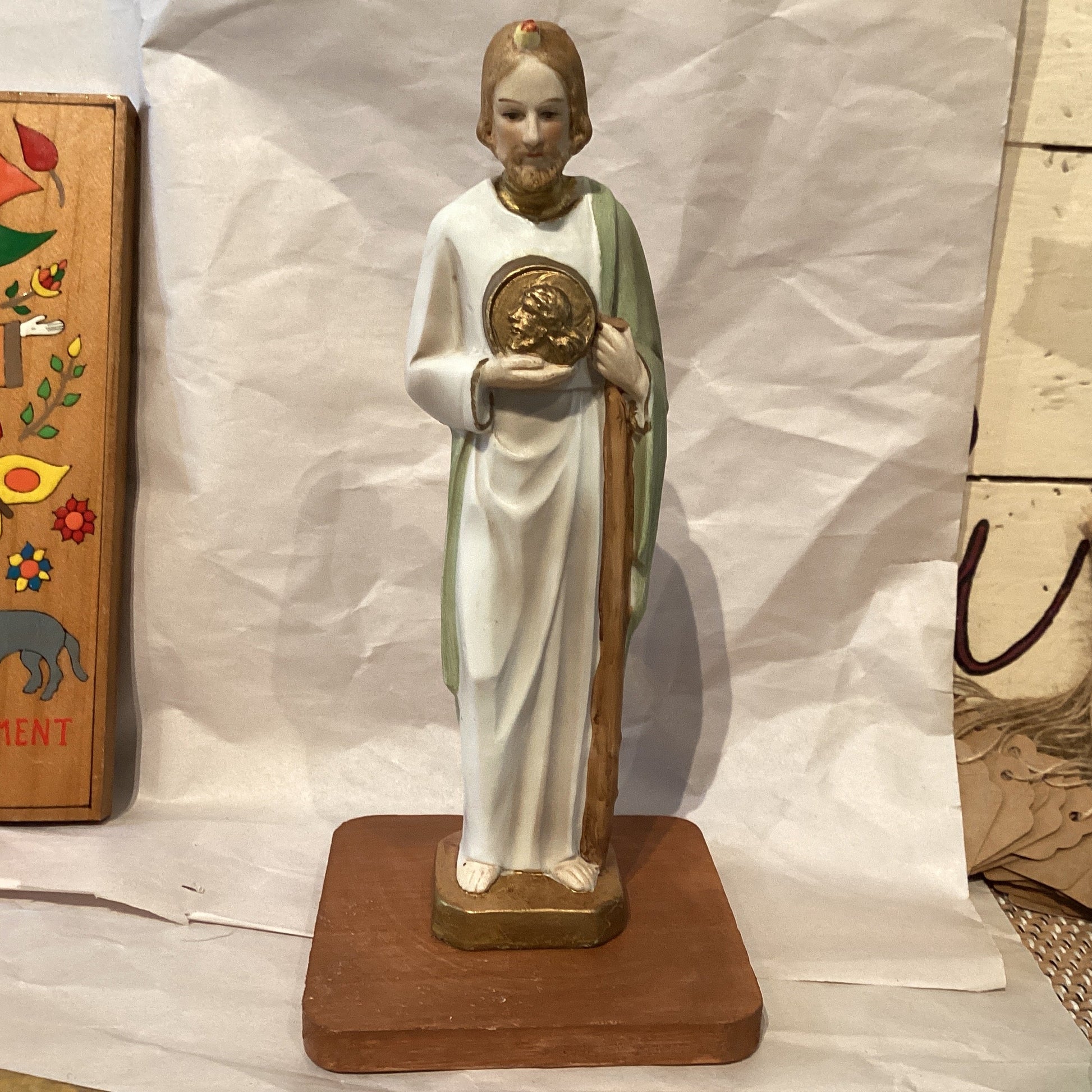 Saint Jude 9-inch statue on wooden base, featuring detailed craftsmanship, perfect for religious decor or gifts.
