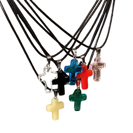 Colored glass cross pendant on adjustable leather cord, Catholic Christian jewelry, symbol of faith and devotion.