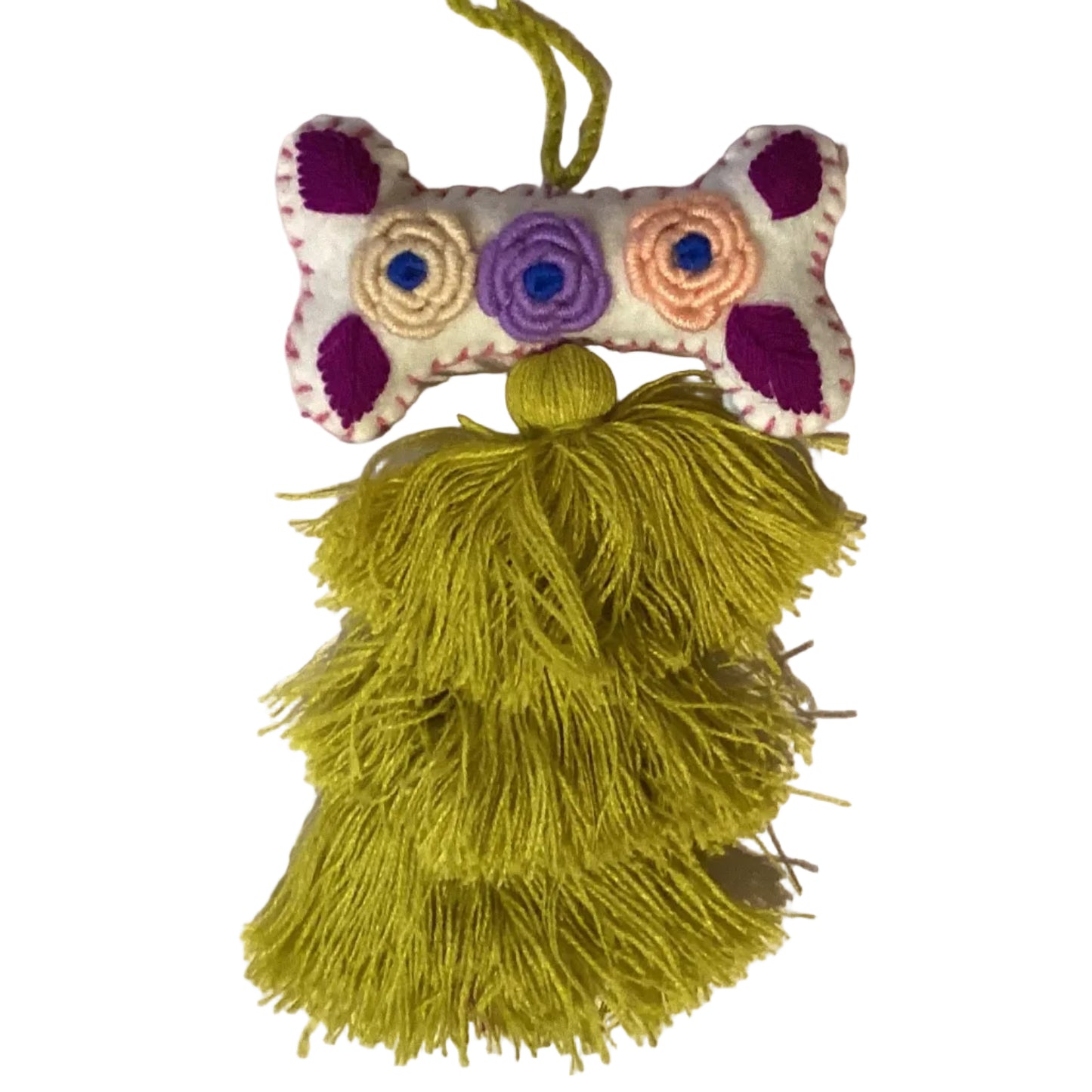 Handcrafted Mexican embroidered dog bone charm with tassel, artisan accessory from Jose Alberto Chavez, featuring vibrant traditional embroidery.