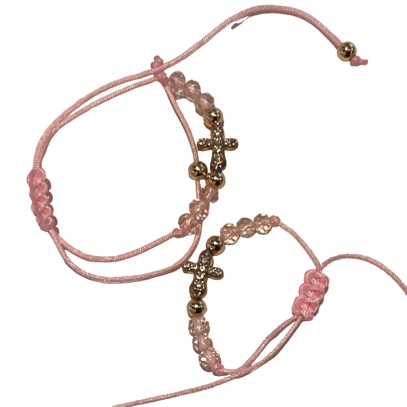 Pink goldtone cross adjustable bracelet with Catholic Christian jewelry design, featuring a delicate cross charm and flexible chain.