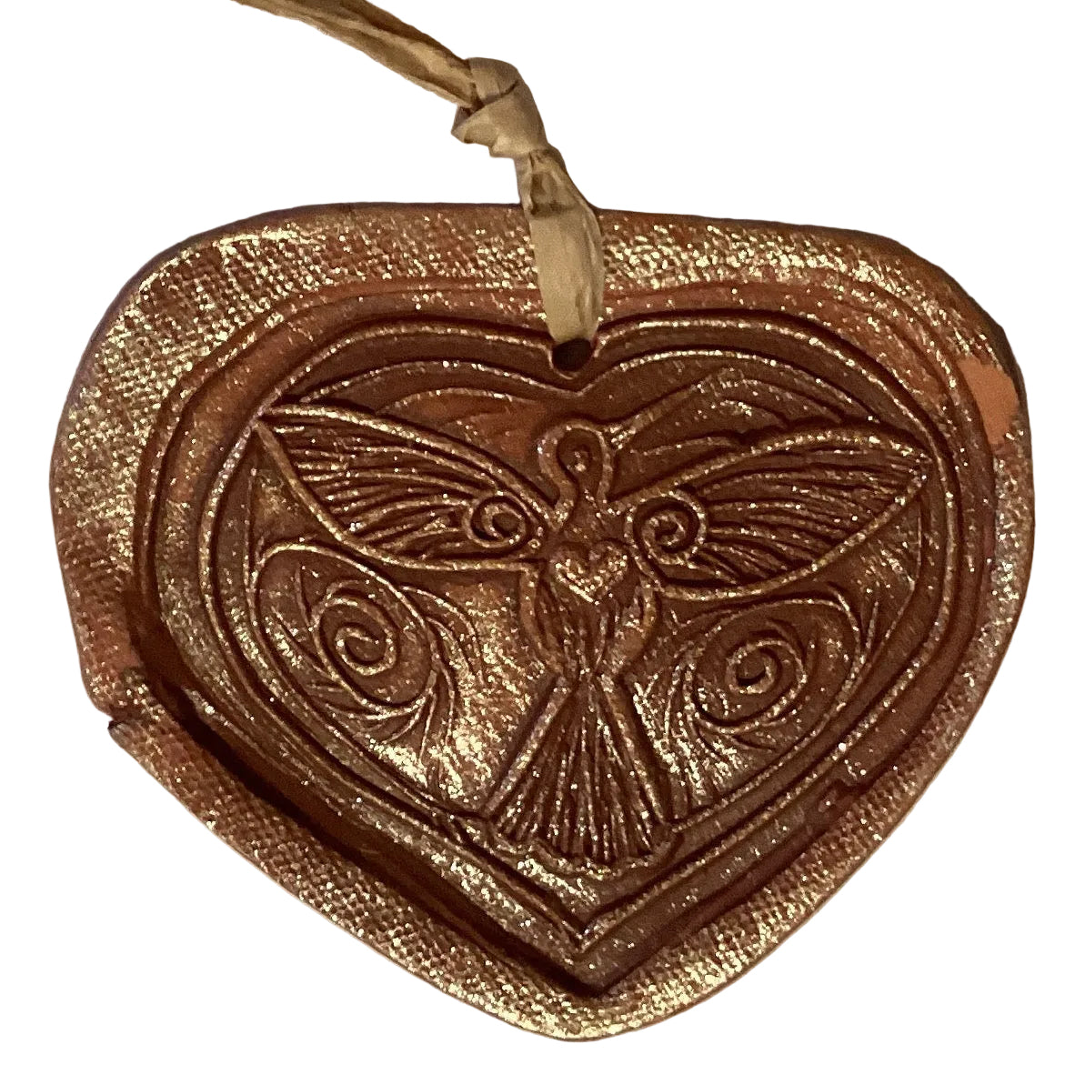 Handmade 4-inch clay decorative ornaments from Ysleta Mission Gift Shop, featuring colorful, handcrafted designs for home decor.