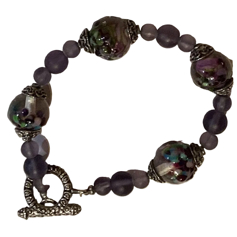Glass beaded bracelet with colorful beads, 8-inch length, handmade jewelry accessory from Ysleta Mission Gift Shop.