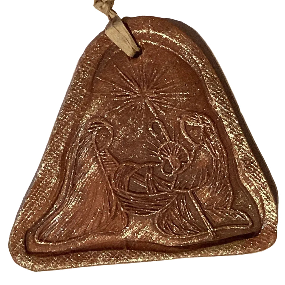 Handmade clay 4-inch decorative ornaments from Ysleta Mission Gift Shop, featuring colorful, handcrafted designs for home decor.