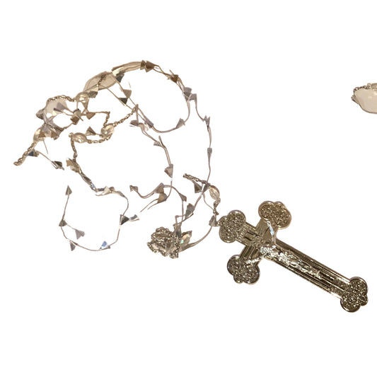 Silver Catholic rosary wall decor featuring five-decade design with faith-inspired hanging, ideal for Christian home religious space.