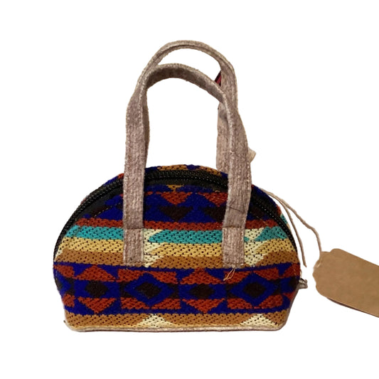 Handwoven Ecuador mini coin purse with zipper, featuring colorful traditional patterns, from Ysleta Mission Gift Shop.