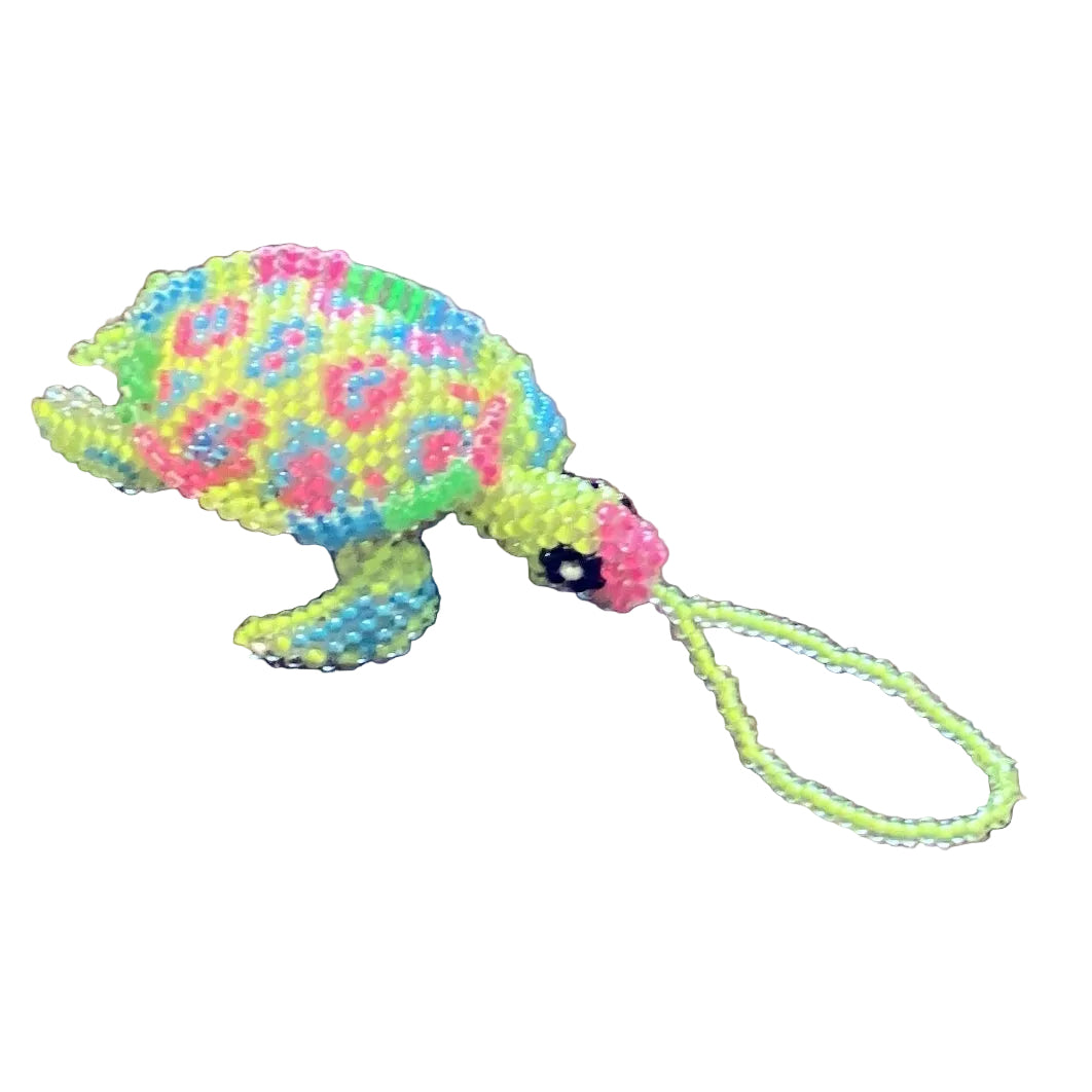 Handmade Mexican beaded turtle ornament by Jose Alberto Chavez, featuring intricate seed bead design, for bag accessories.