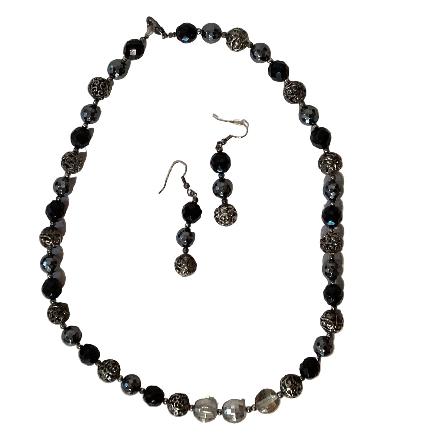 Beaded silver earrings and 21-inch necklace set from Ysleta Mission Gift Shop, featuring intricate beaded jewelry and accessories.